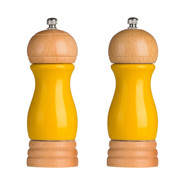 Yellow salt and pepper outlet shakers